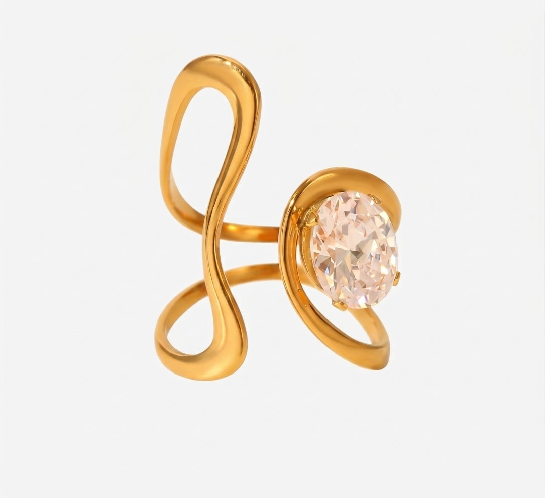 Goldfarbener LOCEVIA Ring mit geschwungenen offenen Linien und ovalem facettiertem Schmuckstein