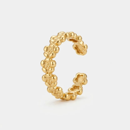 Goldfarbener offener LOCEVIA Ring mit aneinandergereihten plastischen Blütenmotiven