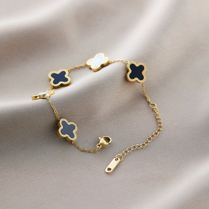 LOCEVIA – Armband mit schwarzen Blütenmotiven